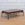 In Stock Manhattan Coffee Table with Poised Faux Porphyry Top