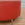 Vintage Upholstered Ottoman or Coffee Table with Red Naugahyde and Polished Legs